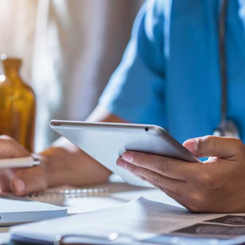 telehealth practitioner on ipad